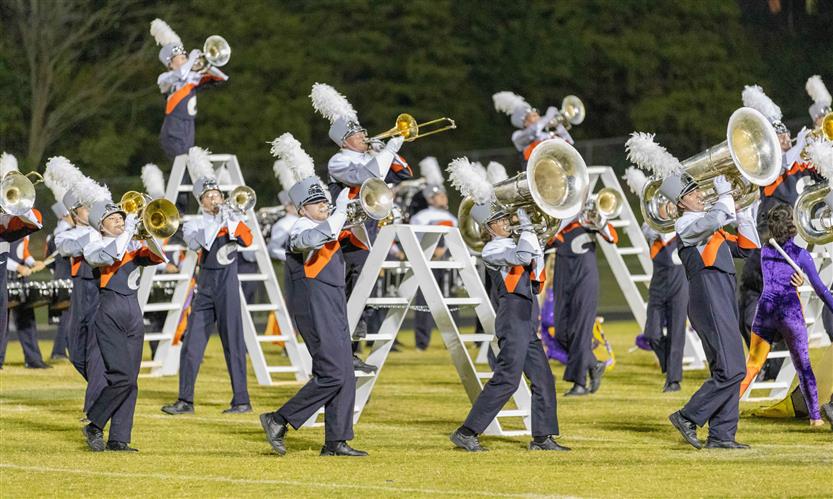 Bands perform on football field
